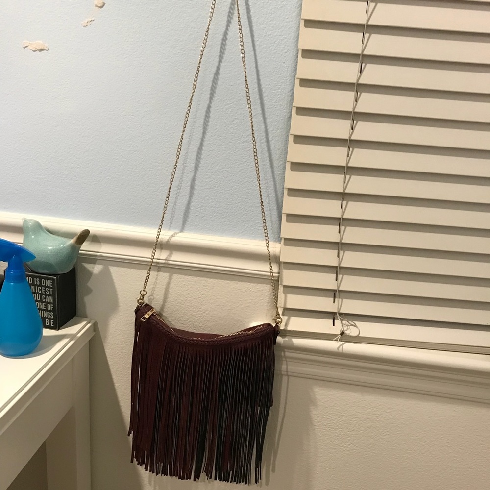 Street level maroon fringe purse